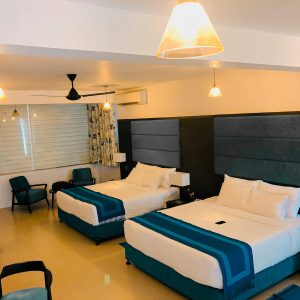 white bed linen on bed
